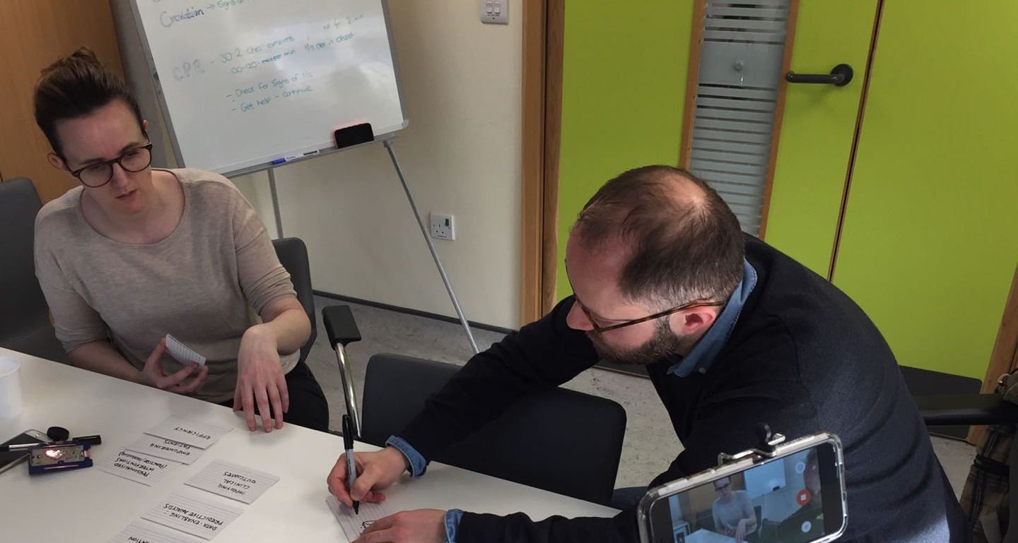 People conducting research on the phone